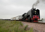 IAIS 7081 waits to re-enter the mainline on the east leg of Yocum Connection west of Homestead, IA on 09-Sept-2006.