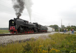 IAIS 7081 sets out its 8-car train on the west leg of the Yocum Connection wye west of Homestead, IA on 09-Sept-2006.