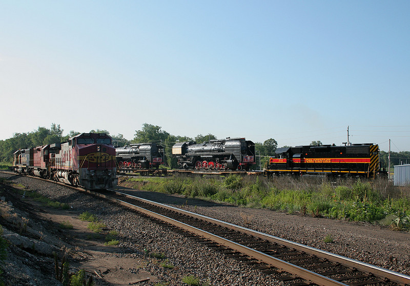 IAIS 711 heads west with the QJ's at Colona, IL on 27-Jun-2006.  The BNSF power is from the M-GALGAL that brought the steamers up from Galesburg.