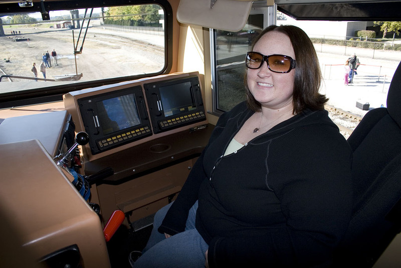 Kristin poses in IAIS 502 on display.  Rock Island, IL.