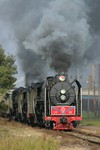 The three depart Rock Island, coming up the branch towards the RI yard.