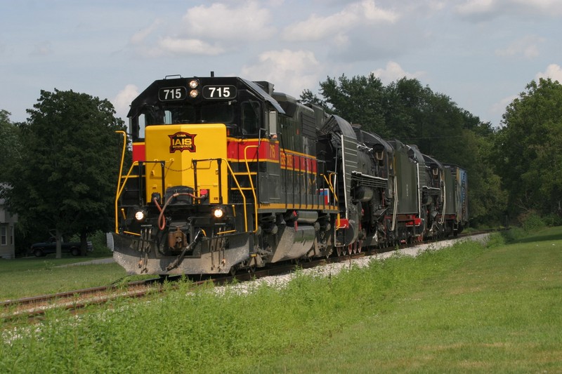 715 coming through Stockton, IA, as the sun breaks through