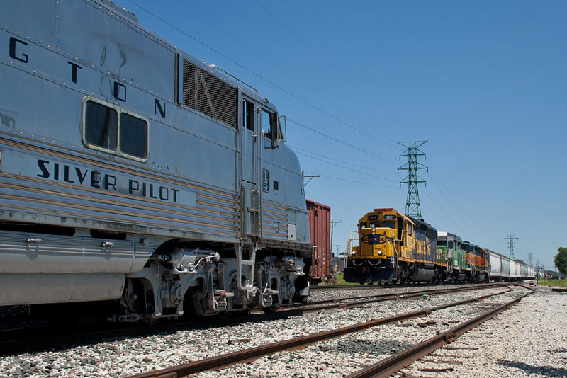 The Zephyr waits in the siding for BNSF's M-CLIGAL to come south at NSS Bettendorf, IA.