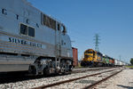 The Zephyr waits in the siding for BNSF's M-CLIGAL to come south at NSS Bettendorf, IA.