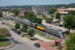 After a 3.5 hour wait, the Nebraska Zephyr finally heads north through downtown Davenport, IA.