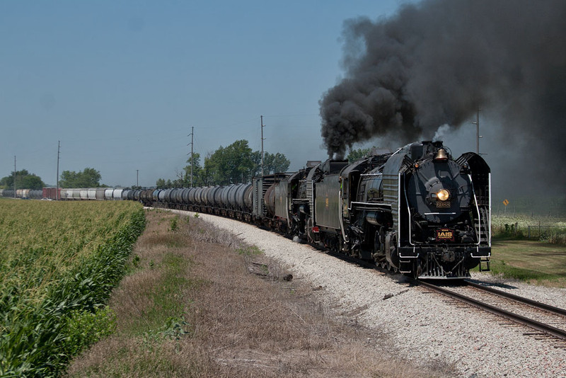 The QJ's swing around the curve east of Walcott, IA.