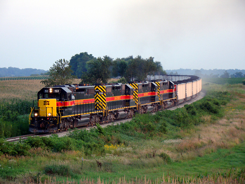 A sight not likely to ever be seen again; four SD38's trailed by the first NOKL coal train head for Cedar Rapids on the ICCR.