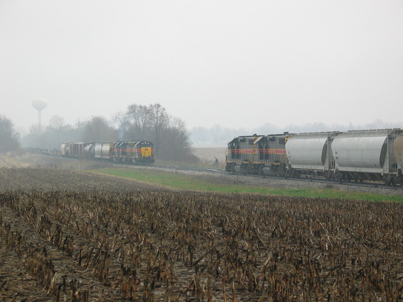 Extra eastbound and the west train meet at the west end of West Liberty siding.  April 6, 2006.