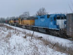 RI turn waits while the coal empties clear at N. Star siding west switch, Jan. 23, 2006.