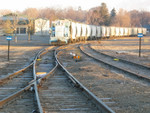 Lone Star Cement's GE in their yard at the North end of the Ill. River bridge.  The track to the left goes down the hill to connect with the IAIS.  Feb. 14, 2006.