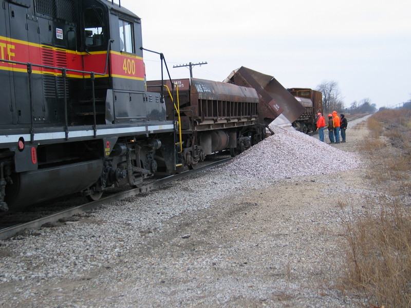 Dumping rock at the west crossing of Twin States siding, Nov. 16, 2006.