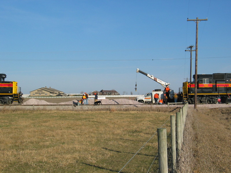 A local dog helps the track crew.