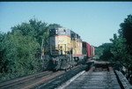 Wilton Local heads west across the Cedar River bridge. Sept. 17, 1993.