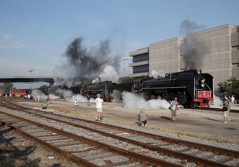 The triple-header pulls up from under the Centennial Bridge to load passengers to take to Bureau and back.  Rock Island, IL.