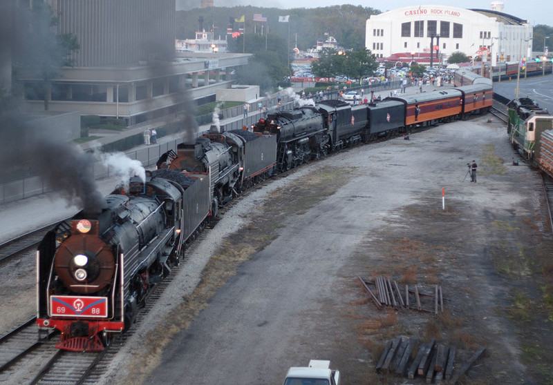 The triple-header arrives in downtown Rock Island, IL.