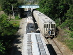 Looking west at La Salle.  The Rocket crew has returned from Utica and is shoving cement empties up the interchange.  Cars from Chessie at Utica, bound for Henry, are left sitting on the main.  Sept. 12, 2007.