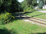 Looking west from the top of the hill, the conductor is "riding the point."