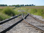 Looking west, just north of Henry.  The crew is shoving around the south leg of the wye off the Peoria main onto the line going to the Henry chemical and fertilizer plants.  Sept. 12, 2007. 142