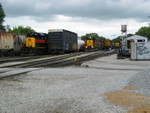 The westbound RI turn has arrived on the siding, while the westbound crew prepares to blast off.