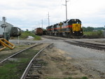 Westbound passes salt hoppers at Hawkeye.