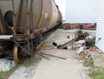 Shugie inspects the track hopper conveyor.