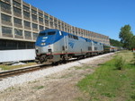 Private car train passes the Westclox plant at La Salle.