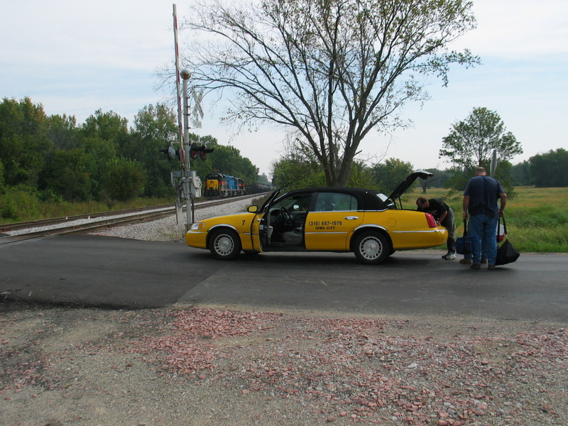 With their train tied down on the siding, the RI turn's crew prepares to ride home in style, Sept. 21, 2007.