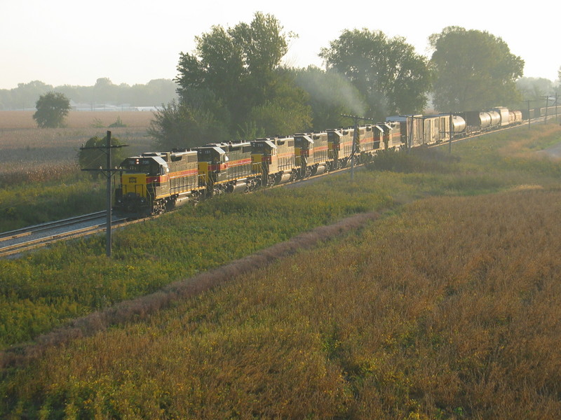 The westbound approaches the Wilton overpass, all 7 engines and 10 cars.