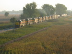 The westbound approaches the Wilton overpass, all 7 engines and 10 cars.