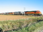 EB BN coal train waits at the grade crossing west of Walcott, Sept. 30, 2010.