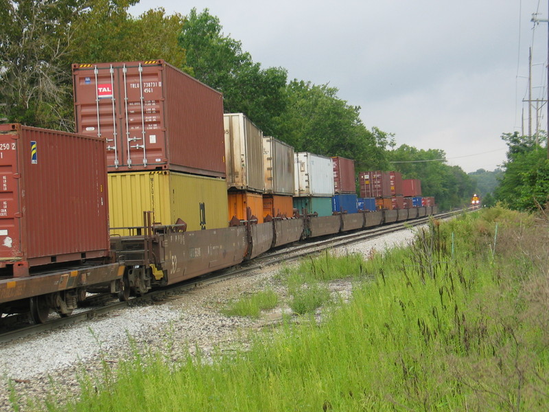 Stacks on the rear of the east train.  The empty coal train is following them down the siding.