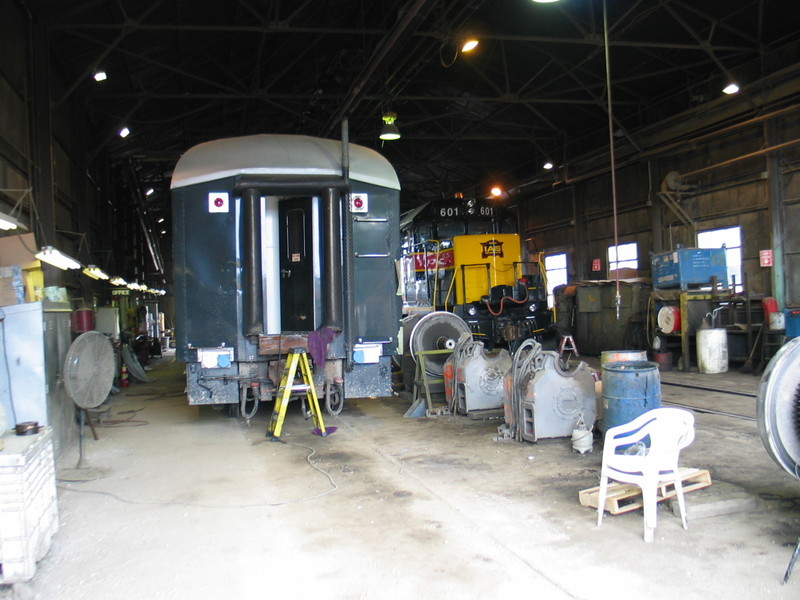 IAIS business car "Hawkeye" in the shop with GP38 601, 6/20/2006