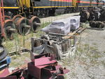 Misc. spare parts, including new (wrapped) traction motors as well as older bad order examples in the upper right.