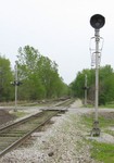 Looking east at Carbon Cliff, IL at the distant signal for the junction at Colona.  April 28, 2006.