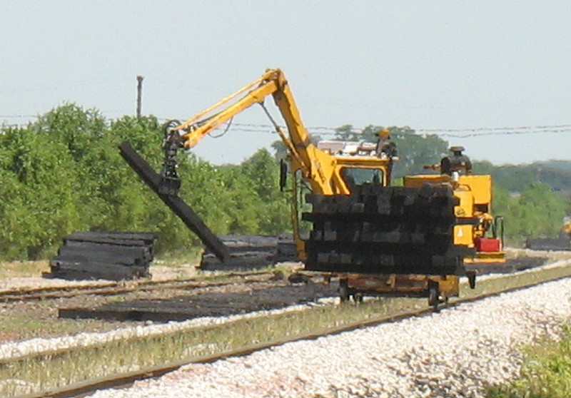 Laying down new ties with a tie crane.  June 23, 2006.