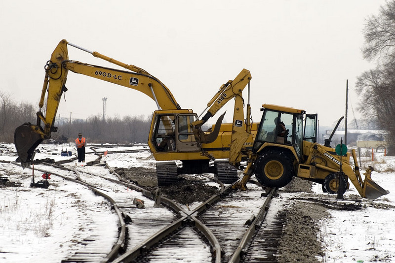 L.A. Colo & Sons works on aligning the yard lead switch off the NRE Lead for the new Silvis Yard.  Silvis, IL.  December 8, 2008.