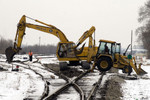 L.A. Colo & Sons works on aligning the yard lead switch off the NRE Lead for the new Silvis Yard.  Silvis, IL.  December 8, 2008.