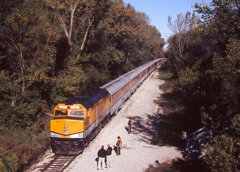 The Hawkeye Express arrives at Kinnick Stadium with another load of fans for the football game.  Melrose Ave, Iowa City, IA on 10/2/04.