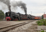 The excursion pulls west out of Rock Island yard and heads up the ramp to the Government Bridge.