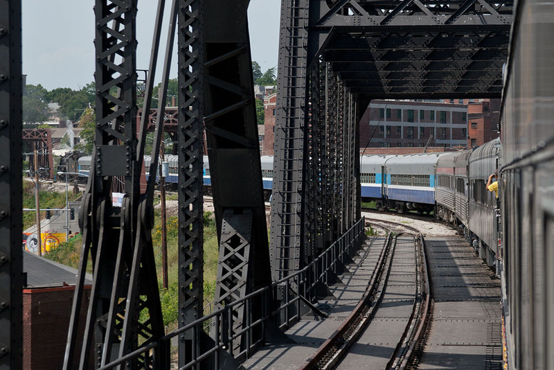 IAIS 6988 is viewed through the bridge and around the curve.