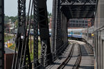 IAIS 6988 is viewed through the bridge and around the curve.