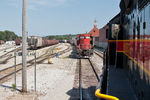 IC&E 114 holds the IAIS main at the west end of Rock Island yard for our train's arrival.