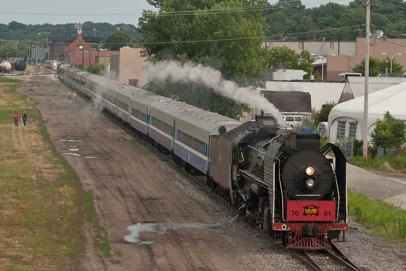 IAIS 7081 and the Nebraska Zephyr wait their turns to enter the Festival grounds while the Amtrak special unloads.  Rock Island, IL