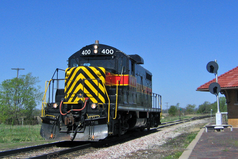 April 26th 2006 brings the 400 running light as the Wilton Turn eastbound past the West Liberty, Iowa CRI&P Depot