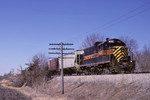 402 East waits at Walcott siding for an "RISW" to come out from Rock Island and swap a few carloads. March 24, 1999