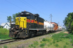 403 comes west down the BNSF Industrial Track with the weed sprayer near ESS Moline siding (IL) June 22, 2005
