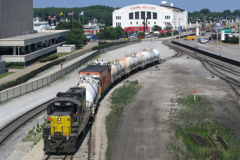 The weed sprayer winds it way through the BNSF Lower Yard at Rock Island, Illinois where the train will access the Milan branch for it's dose of atrazine.