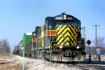 The 405 heads up an ICRI train taking the hole for "BICB" at Twin States siding near Durant, Iowa March 19, 1999