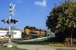 In the twilight era of the 400s, IAIS 413 West hammers through Walcott, Iowa with "BICB" October 29, 2004