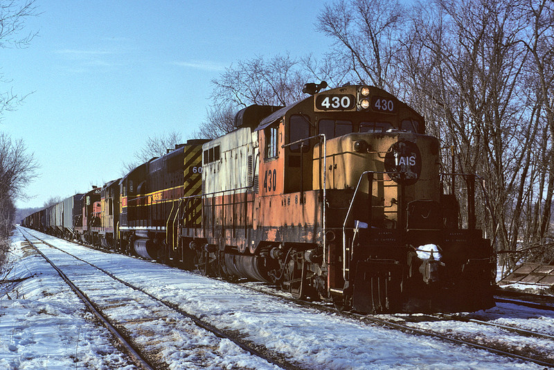 #430 brings an eastbound up to Bureau, Illinois - February 28th, 1993.